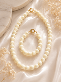 Gele parelketting